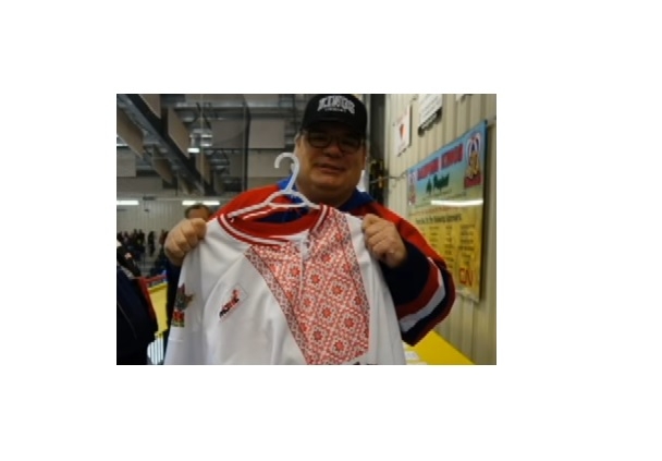 Rodney Juba showing off a Dauphin Kings Ukrainian jersey