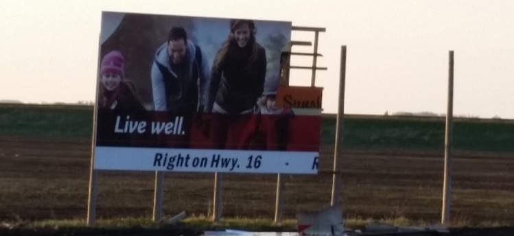 Photo of the damaged billboard in May 2015 -- submitted by Brad Collett